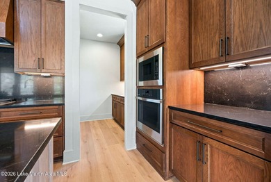 Positioned within White Oak Landing, this 5 bedroom, 3 bath lake - photo 32