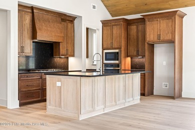Positioned within White Oak Landing, this 5 bedroom, 3 bath lake - photo 33
