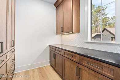 Positioned within White Oak Landing, this 5 bedroom, 3 bath lake - photo 37