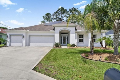 Welcome to your waterfront dream home in Palm Coast. Built in - photo 1