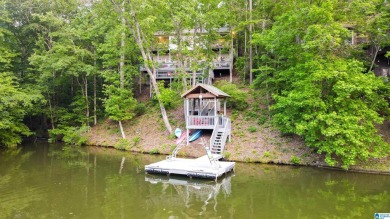 Charming lakefront home ready for lake living! Enjoy the lake - Lake Home For Sale in Wedowee, Alabama