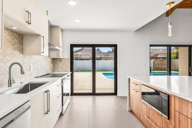 Stunning Modern Home with Heated Pool! Situated in desirable - photo 11