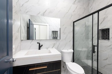 Welcome to this fully renovated 3-bedroom, 2.5-bathroom home - photo 11