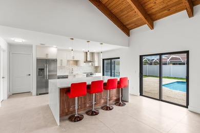 Stunning Modern Home with Heated Pool! Situated in desirable - photo 13