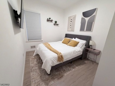Welcome to this exceptional, fully renovated two-family - photo 6