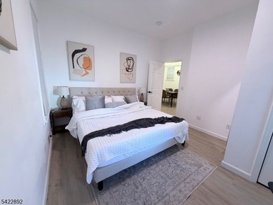 Welcome to this exceptional, fully renovated two-family - photo 7