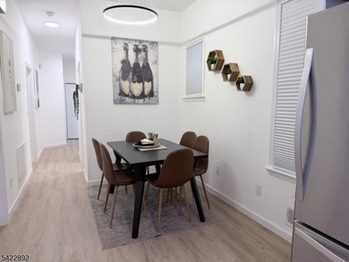 Welcome to this exceptional, fully renovated two-family - photo 10