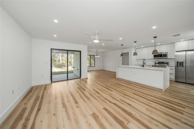 Virtually Staged. Stunning custom-built home featuring high-end - photo 3