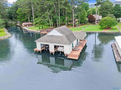 Beautiful lakefront home on a rare level lot with stunning - photo 1