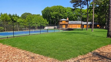 A sweeping circular driveway welcomes you to this ultra-private - photo 12