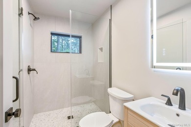 A sweeping circular driveway welcomes you to this ultra-private - photo 29