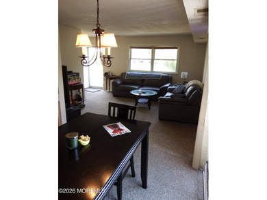 This is a 816 square foot maintenance friendly end unit condo - photo 3