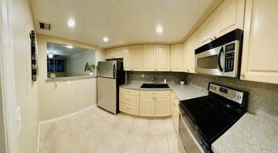 Beautiful waterfront condo located on the 1st floor with water - photo 2