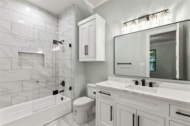 Estate-style waterfront new construction on approximately .58 - photo 21