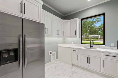 Estate-style waterfront new construction on approximately .58 - photo 25
