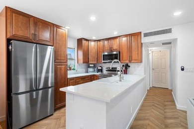 Gorgeous, updated, waterfront 2 bed 2 bath villa in highly - photo 1