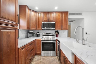 Gorgeous, updated, waterfront 2 bed 2 bath villa in highly - photo 2