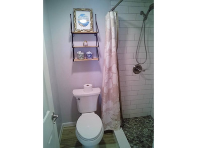 Beautifully maintained ground-floor condo located in the - photo 10