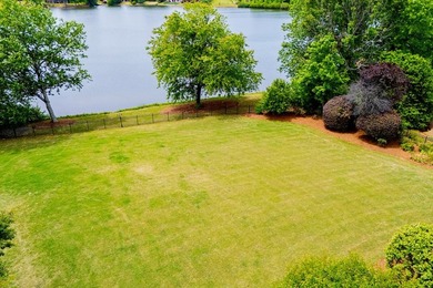 Coming soon! Lakeside Luxury! This stunning 4-sided brick ranch - photo 27