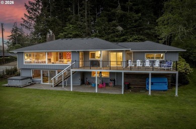 Enjoy this classic lakefront home with stunning views on the - photo 2
