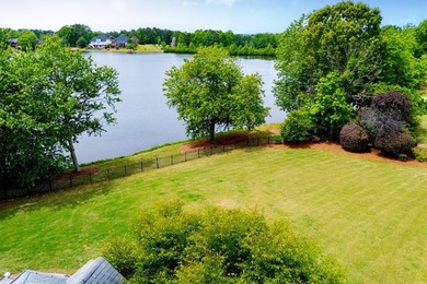 Coming soon! Lakeside Luxury! This stunning 4-sided brick ranch - photo 32
