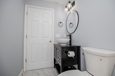 Coming soon! Lakeside Luxury! This stunning 4-sided brick ranch - photo 49