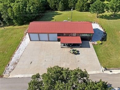 Experience luxury lake living in this expansive log-style - photo 4