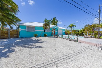 Welcome to your cozy coastal retreat in Cudjoe Gardens in the - photo 2