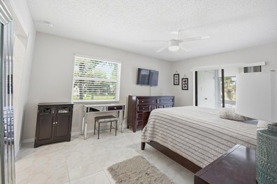 Step into this deluxe, completely renovated model featuring an - photo 9