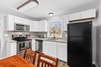 A full 2022 renovation, a big fenced yard, and a commute you can - photo 8