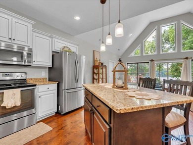 Positioned on the Elk River, this 3-bedroom, 2-bath riverfront - photo 7