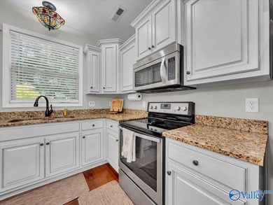 Positioned on the Elk River, this 3-bedroom, 2-bath riverfront - photo 9