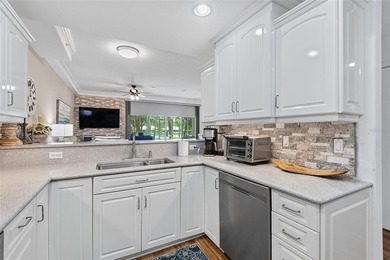 Experience luxury waterfront living in this beautifully updated - photo 6