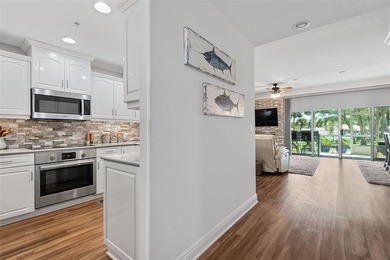 Experience luxury waterfront living in this beautifully updated - photo 7