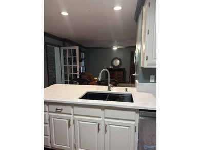 Welcome home to this beautifully renovated 4-bedroom residence - photo 7