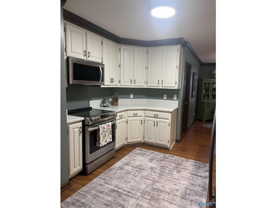 Welcome home to this beautifully renovated 4-bedroom residence - photo 8
