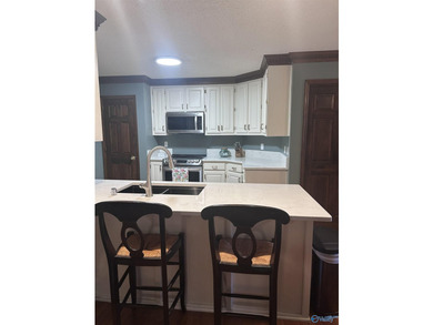 Welcome home to this beautifully renovated 4-bedroom residence - photo 9