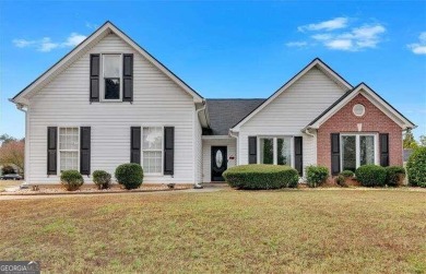 Lake Home For Sale in Flowery Branch, Georgia