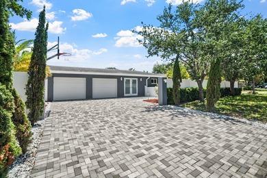 Presenting a COMPLETELY REMODELED 4-bedroom, 4-bath family home - photo 1