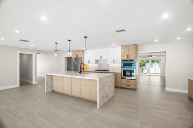Presenting a COMPLETELY REMODELED 4-bedroom, 4-bath family home - photo 4