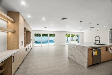 Presenting a COMPLETELY REMODELED 4-bedroom, 4-bath family home - photo 6