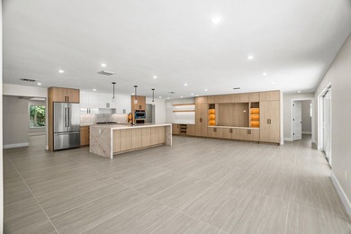 Presenting a COMPLETELY REMODELED 4-bedroom, 4-bath family home - photo 7