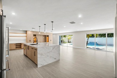 Presenting a COMPLETELY REMODELED 4-bedroom, 4-bath family home - photo 9
