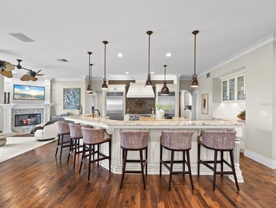 Welcome to an extraordinary waterfront estate in the prestigious - photo 11