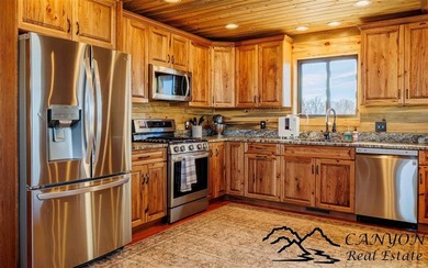 This exceptional creekside property offers a rare blend of - photo 11