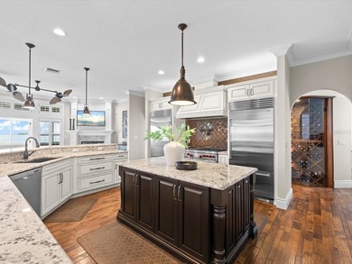 Welcome to an extraordinary waterfront estate in the prestigious - photo 12