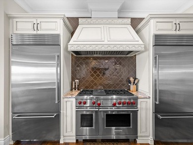 Welcome to an extraordinary waterfront estate in the prestigious - photo 13