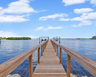 Welcome to an extraordinary waterfront estate in the prestigious - photo 49