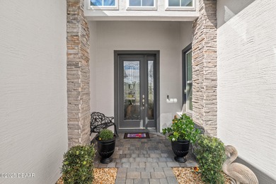 Boasting over $100,000 in PREMIUM UPGRADES, this residence - photo 3