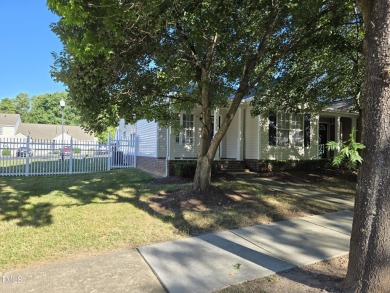 Great one level, end unit townhome in the heart of Wake Forest